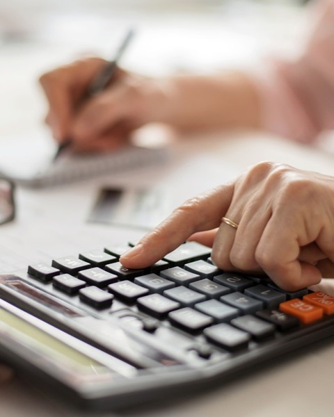 Image of business handshake or financial charts